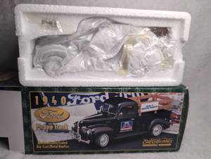 lot 3105 image: Ertl Collectibles 1940 Ford Pickup Truck Big A Auto Parts Die-Cast Replica