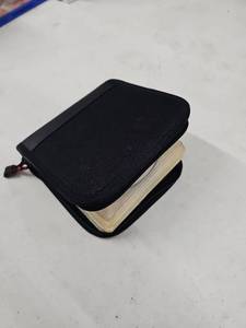 lot 20862 image: Black Zippered Media Wallet with Miscellaneous DVDs
