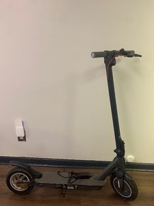 lot 26 image: Electric Scooter  Model ES09 w Charger