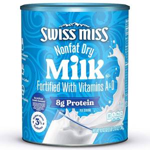 lot 4438 image: Swiss Miss Shelf Stable Nonfat Dry Powdered Milk, 45.43 oz. Canister   Fortified with Vitamins A and D, Excellent Source of Calcium. BB MAY 2027
