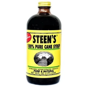 lot 4541 image: Steens 100% Pure Cane Syrup, 16 oz Bottle. BB AUG 2027