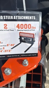 lot 523 image: Skid Steer unused Hydraulic Pallet Fork Attachment 48 4000 lbs - Model XN-TPC01-48