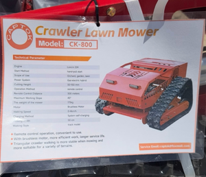 lot 303 image: Captok unused Crawler Lawn Mower CK-800 Remote Control Track Model