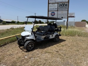 lot 328 image: White - CAPTOK unused 6 SEATS Off-Road Golf Cart With Front Basket CK-GC42S 42 Seats - Has Scuff on drivers side rear fender well area