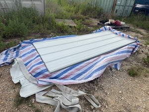 lot 31 image: Galvalume Steel Siding & Roofing Panels - QTY 150 with 3 of them damaged