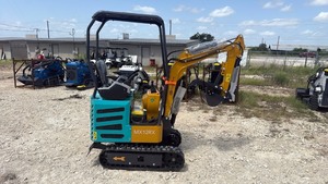 lot 76 image: MX12RX Mini Excavator with Articulating Boom and Bucket Attachment