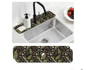 lot 58168 image: Kitchen Sink Splash Guard Faucet Mats - Fern and Berries Pattern (2-Pack) - Retail $12
