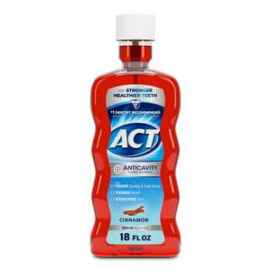 lot 58179 image: ACT Anticavity Fluoride Mouthwash  Triple Action Cinnamon  18 fl. oz. - Retail $5