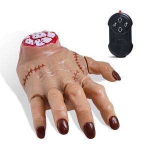 lot 42761 image: SANGQAOFU Wednesday Thing Hand Toy RC Crawling Hand with Lights, Music & Moving Fingers, Life Size Remote Control Halloween Animatronic Decorations - Retail $22