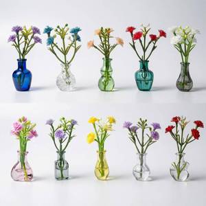 lot 43160 image: 10-Pack Magnetic Mini Clear Glass Bud Vases for Fridge - Strong Magnets, Leak-Proof Propagation Vases with 10 Faux Flowers for Mom, Locker and Cubicle Decor(Sea Glass Green) - Retail $13