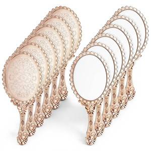 lot 9350 image: 12 Pcs Vintage Handheld Mirrors, 9.8 L x 4.5 W Rose Gold Embossed Flower Portable Princess Mirror Portable Hand Held Embossed Flower Retro Compact Mirror with Handle for Women Princess Party Makeup - Retail $20