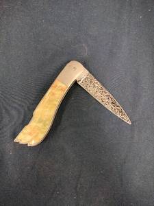 lot 62042 image: ornate folding pocket knife
