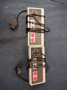 lot 62148 image: Nintendo Entertainment System (NES) controllers