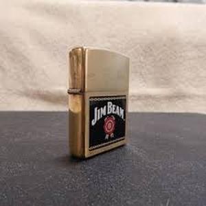 lot 62081 image: Brass Jim Beam Zippo Lighter 2001 In Protective Tin Rare