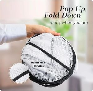 lot 63296 image: Foldable Laundry Basket - Popup and Collapsible, Durable Mesh Material, Folds for Storage, Easy Carry Handles - Great Hamper for College Dorm, Laundry Room or Travel (White-Black, 2-Compartments) - Retail $7