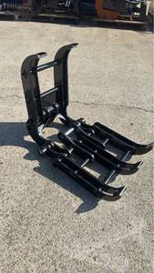 lot 56046 image: Mini Skid Steer Grapple