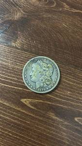 lot 40412 image: 1879 Morgan Silver Dollar