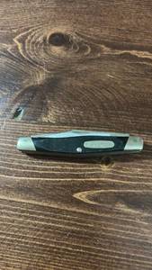 lot 40422 image: Bass Pro Shops Folding Pocket Knife with Black Handle