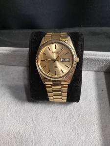 lot 6137 image: Seiko SQ Quartz Gold-Tone Day-Date Watch