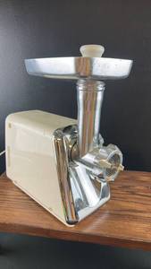 lot 6455 image: Back to Basics Electric Meat Grinder powers on
