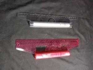 lot 50307 image: Rolling Ruler Set with Protractor and Slide Rule