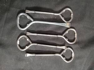 lot 50314 image: Set of 4 Stainless Steel Bottle Openers