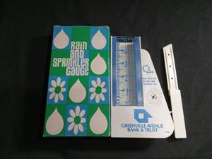 lot 6005 image: Greenville Avenue Bank & Trust Rain and Sprinkler Gauge with Original Box