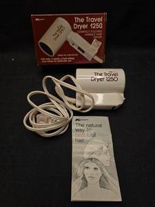 lot 50844 image: Kmart Travel Dryer 1250 Compact Folding Handle Hair Dryer with Box and Manual