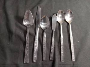 lot 50292 image: Stainless Steel Flatware Set with Floral Embossed Handles