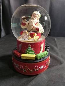 lot 50453 image: Coca-Cola Santa Claus Musical Snow Globe with Rotating Train by Hallmark