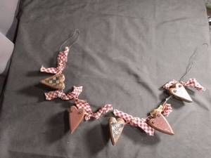 lot 50469 image: Primitive Wooden Heart Garland with Red Gingham Ribbon