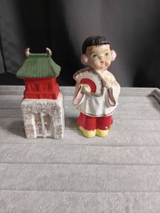 lot 5626 image: Japanese Kokeshi Doll and Pagoda Temple Salt and Pepper Shakers Set