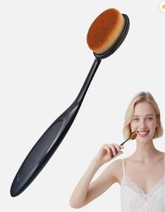 lot 983 image: The Cr me Shop Omg Brush White Foundation Powder Large