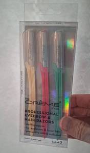 lot 987 image: The Creme Shop Professional Eyebrow & Facial Razors, Set of 3