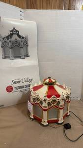 lot 1028 image: Department 56 Snow Village The Carnival Carousel with Musical Rotating Projection Screen top needs repaired