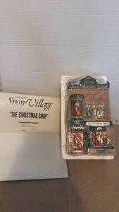lot 1069 image: Department 56 Snow Village The Christmas Shop