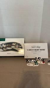 lot 1097 image: Department 56 Snow Village Thoroughbreds & A Herd of Holiday Heifers Figurine Set