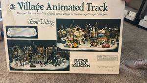 lot 1101 image: Department 56 Village Animated Track
