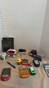 lot 1176 image: Mixed Lot of Electronic Handheld Games, Office Supplies & Collectibles