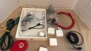 lot 1178 image: Apple and other chargers along with other cords