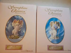 lot 1308 image: Seraphim Classics Heaven on Earth Figurines   Joelle, Natures Spirit.  Raphael, In Heavens Care