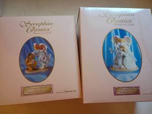 lot 1309 image: Seraphim Classics Heaven on Earth Figurines.  Caring Touch, Angel with Fireman.   Eternal Love, The Wedding Angel