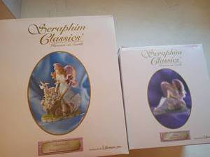 lot 1311 image: Seraphim Classics Heaven on Earth Figurines    Danielle, Messenger of Love.   Eve, Tender Heart