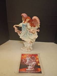 lot 1319 image: Seraphim Classics Heaven on Earth Figurines.  Ariel, Heavens Shining Star
