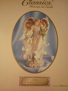 lot 1320 image: Seraphim Classics Heaven on Earth Figurines.  Ashley with the Bluebird of Happiness