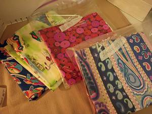 lot 2140 image: Fabric.  Spools, Jungle Stripe, Airplanes Trucks, Tricycle, Bus and Train