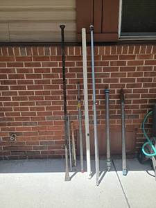 lot 3401 image: Miscellaneous Poles.  Flag pole, Steel Bar with Chisel End and More
