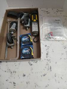 lot 3460 image: Hand saw, casters, tape measures,work light