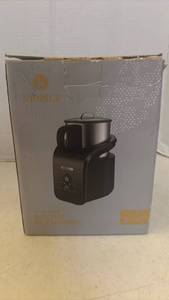 lot 7002 image: Kidisle Detachable Electric Milk Frother