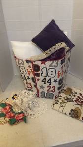lot 7013 image: Storage Bin, Decorative Pillows, Crocheted Doilies and Embroidered Pillow Covers